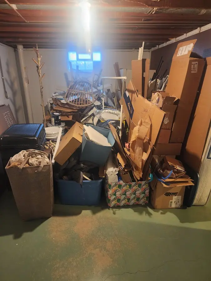 Roll-off dumpster container at job site for Yard Waste Dumpster Rental in Kittery